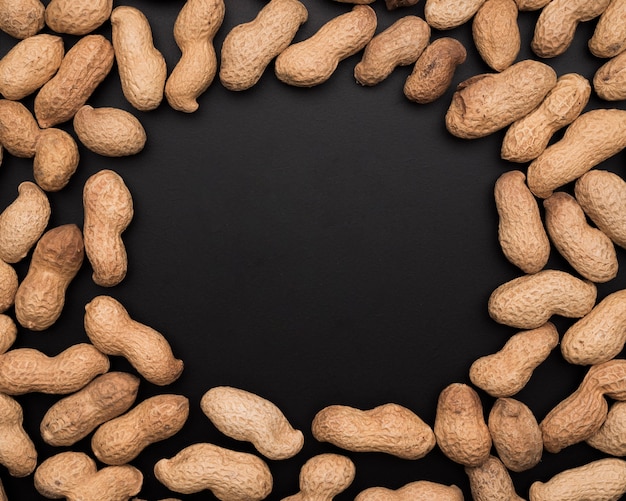 Free photo flat lay of peanuts with copy space