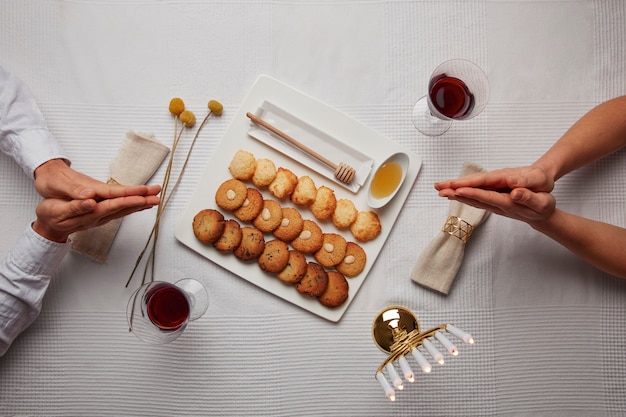 Free Photo flat lay of people having a feast for the first day of passover seder