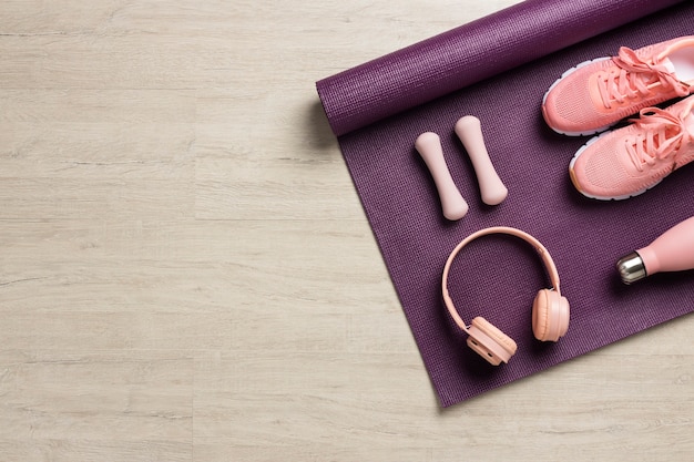 Flat lay perfectly ordered gym equipment