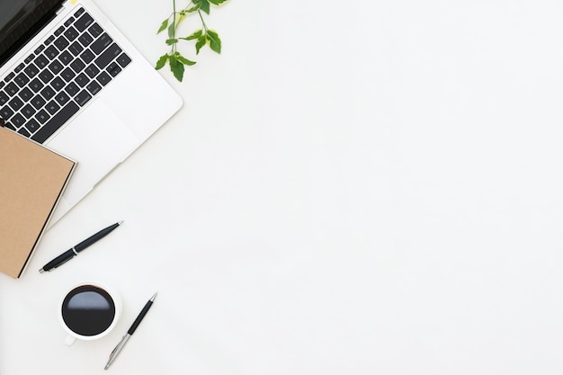 Free Photo flat lay photo of office desk with laptop copy space background