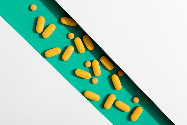 Free Photo flat lay of pills in shape