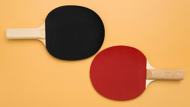 Flat lay of ping pong paddles