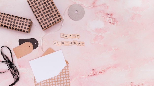 Free photo flat lay pink birthday supplies with copy space