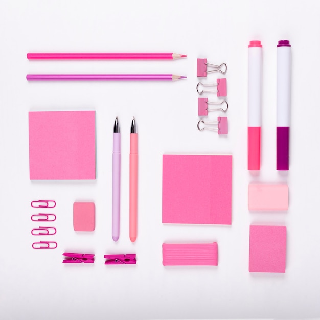 Flat lay pink items assortment