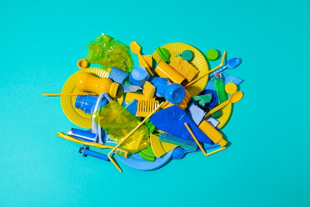 Free Photo flat lay plastic objects arrangement