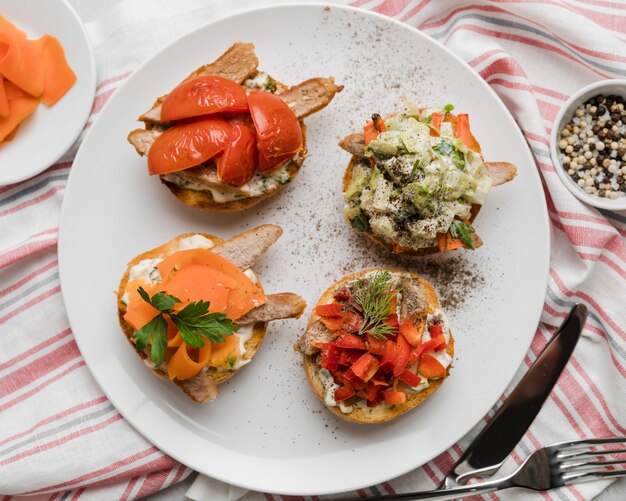 Flat lay plate with bruschettas