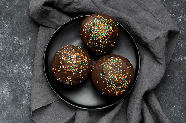 Free Photo flat lay of plate with chocolate muffins