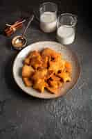 Free photo flat lay plate with different shaped biscuits