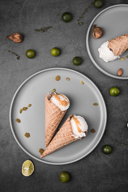 Free Photo flat lay plates with flavored ice cream