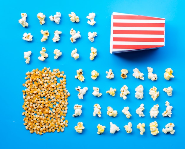 Free photo flat lay of popcorn and kernels