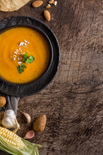 Free photo flat lay pumpkin cream soup in bowl