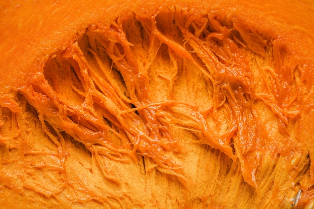 Free photo flat lay pumpkin insides background