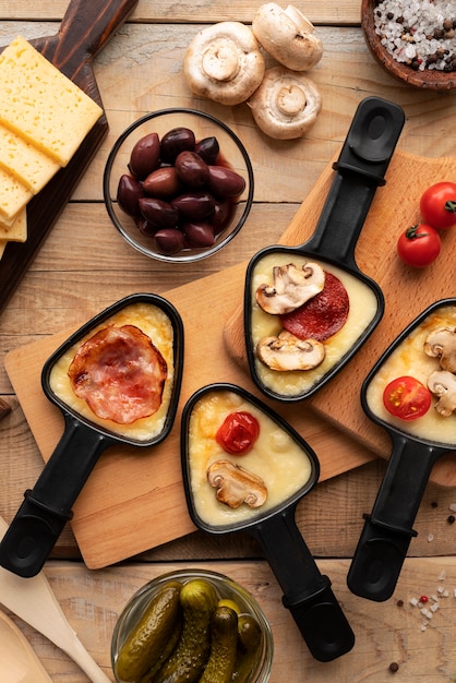 Free Photo flat lay of raclette dish with ingredients and delicious food