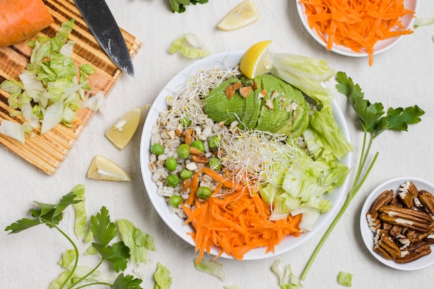 Flat lay of raw vegetables on plate