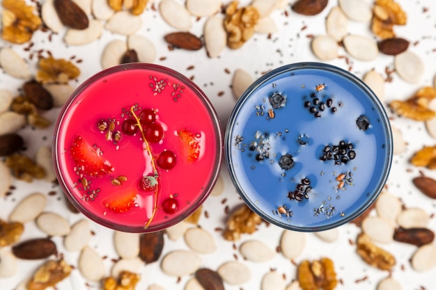 Flat lay red and blue smoothies