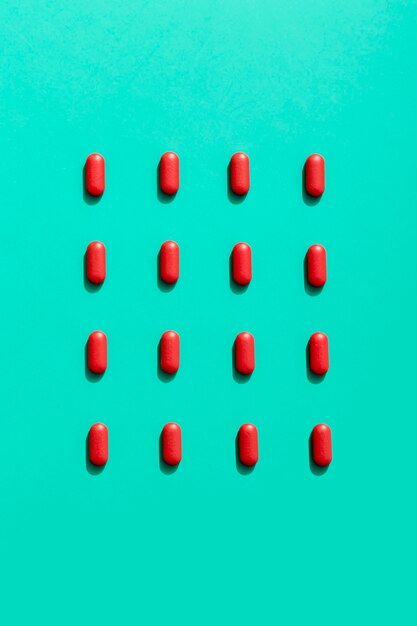 Free Photo flat lay of red pills