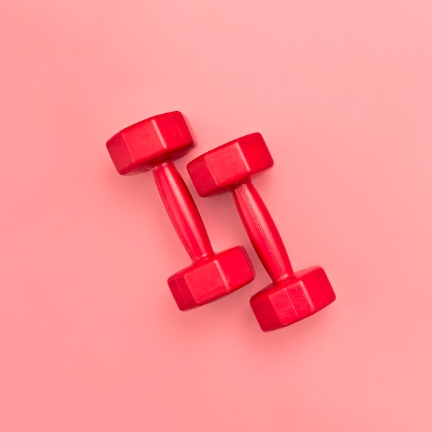 Free Photo flat lay of red weights