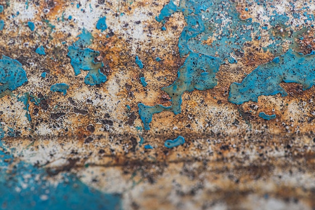 Free Photo flat lay of rusty metal surface with paint peel