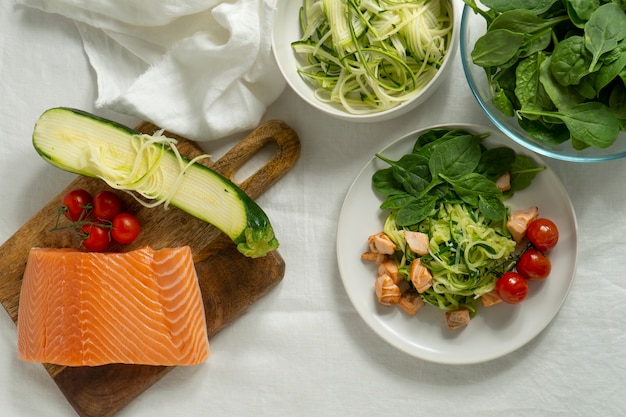 Free Photo flat lay salmon and vegetables arrangement