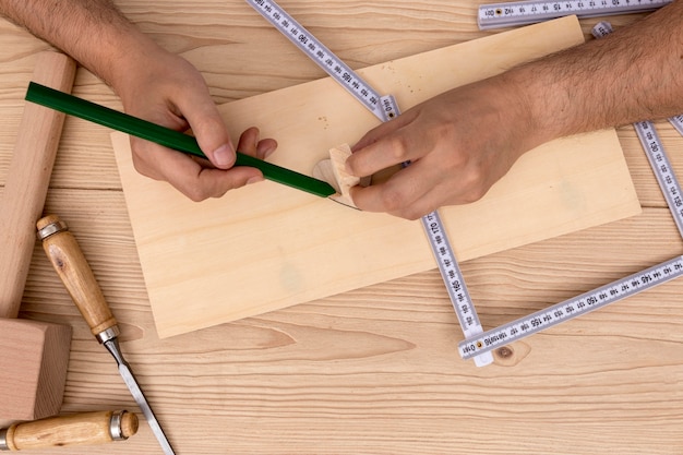 Free Photo flat lay skilled carpenter hands