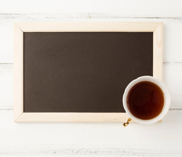 Flat lay slate template with tea concept