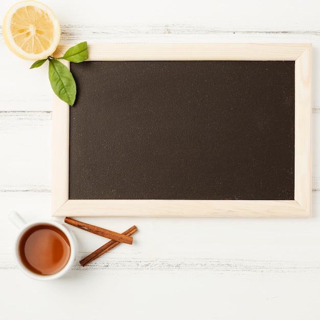 Flat lay slate template with tea concept