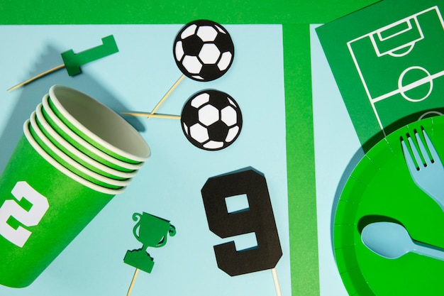 Free photo flat lay soccer birthday items arrangement