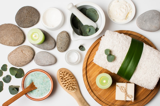 Flat lay spa concept with towel and stones