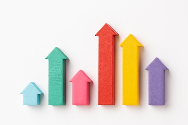 Flat lay of statistics presentation with chart and arrows