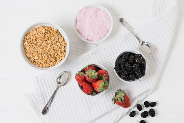 Flat lay of strawberries and mulberries