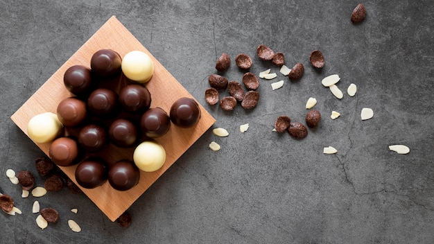 Flat lay sweet chocolate arrangement with copy space