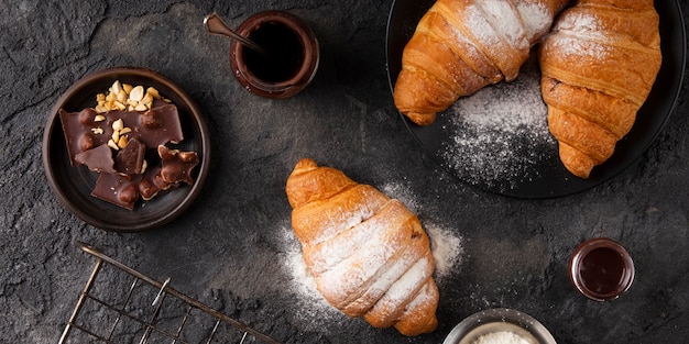 Flat lay sweet croissants arrangement