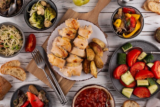 Flat lay table full of delicious food arrangement