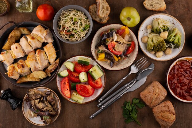 Flat lay table full of delicious food arrangement