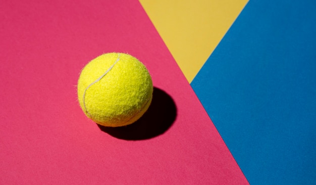 Flat lay of tennis ball with copy space