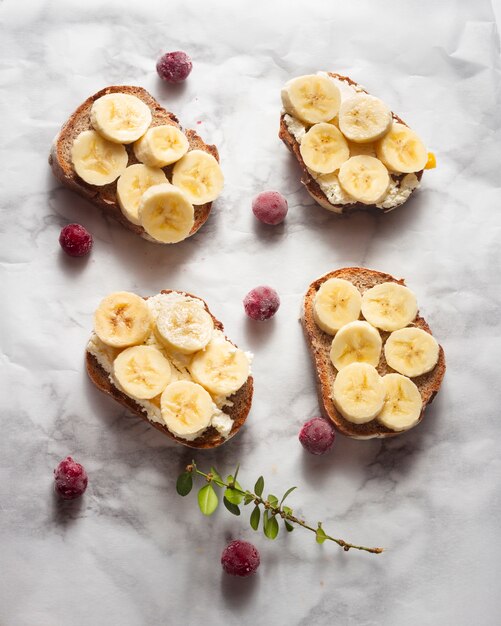 Flat lay toast with sliced bananas