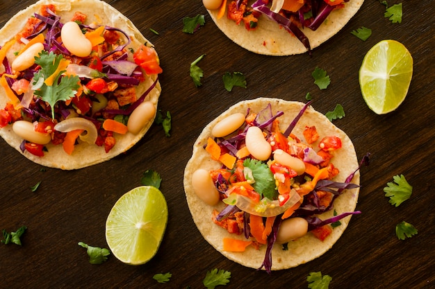 Free Photo flat lay tortilla with vegetables and meat