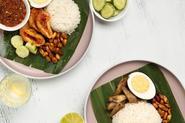 Free photo flat lay traditional nasi lemak meal composition