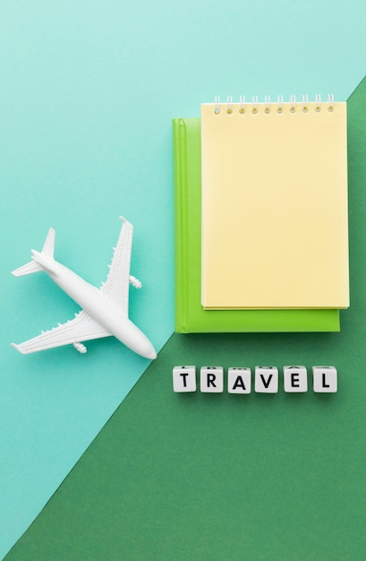 Free Photo flat lay travel concept with white plane