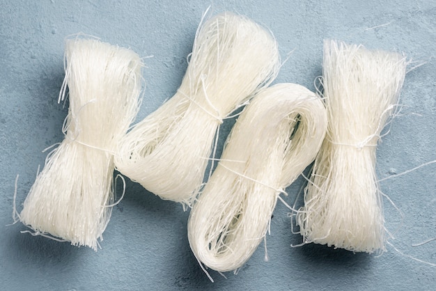 Flat lay uncooked rice noodles