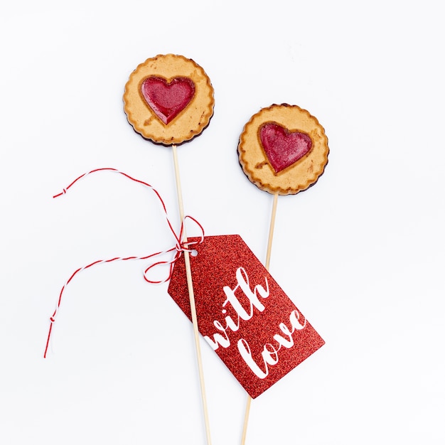 Free photo flat lay of valentines day cookies with tag