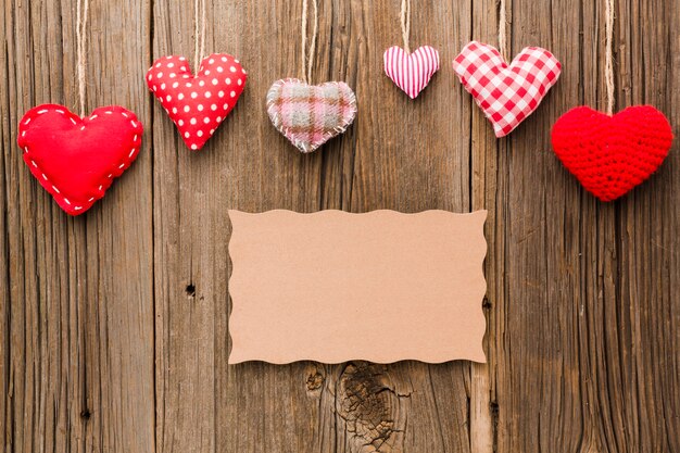 Flat lay of valentines day ornaments with paper