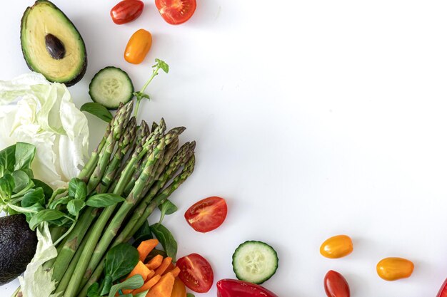 Flat lay vegetables on white background food and diet concept