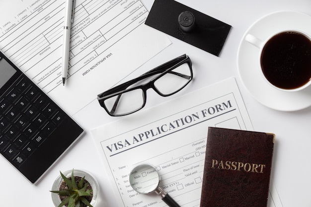 Flat lay visa application assortment