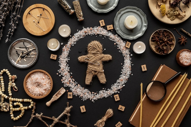 Free Photo flat lay voodoo doll and esoteric items arrangement