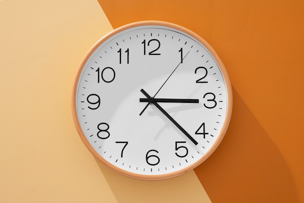 Free photo flat lay wall clock still life