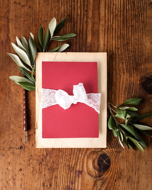 Free photo flat lay wedding card on table