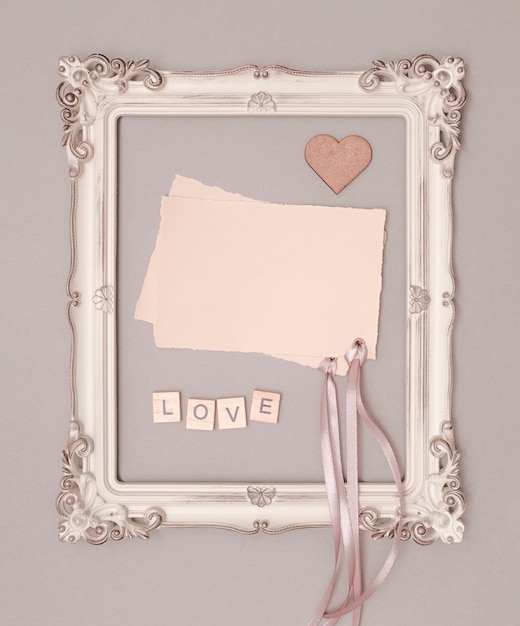 Flat lay wedding invitation mock-up in vintage frame