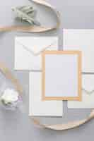 Free photo flat lay  of wedding invitation with copy space