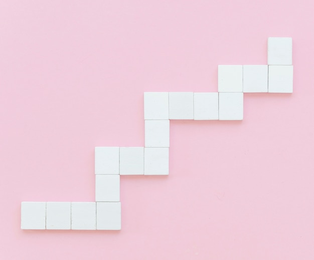 Free photo flat lay of wooden block in stairs